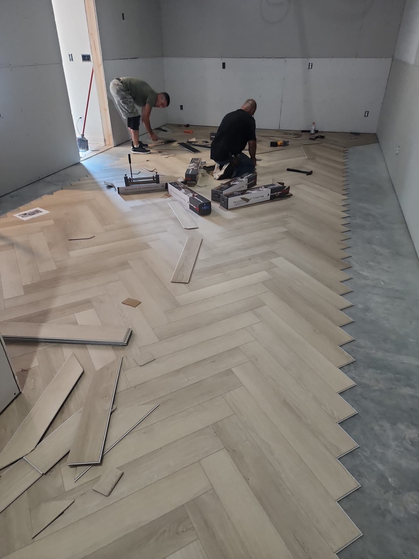 Skilled flooring installer at work